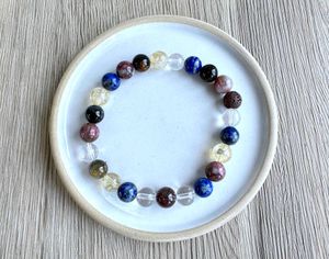 Libra crystal birth stone bracelet on dish