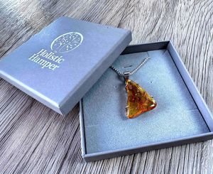 Amber sterling silver pendant in box