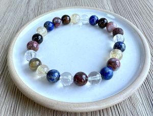 Libra crystal birth stone bracelet on dish