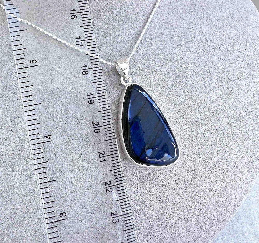 blue flash labradorite freeform sterling silver crystal pendant on optional chain with ruler to show sizing