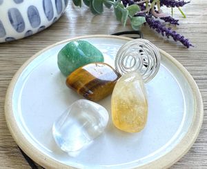 Manifestation crystal cage necklace set with four tumble stones from the holistic hamper crystal shop