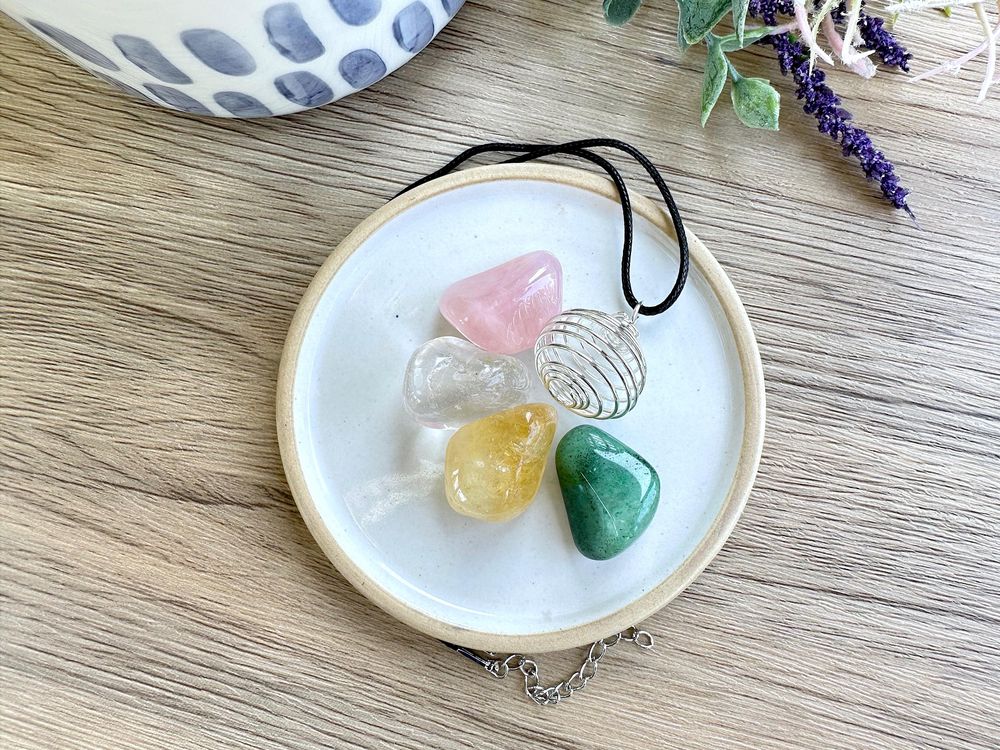 Good vibes self love crystal set with four tumble stones and a wire pendant necklace