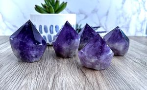 five deep purple amethyst points