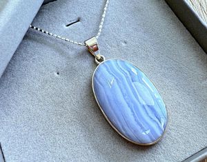 blue lace agate oval crystal pendant with sterling silver in box, the holistic hamper crystals
