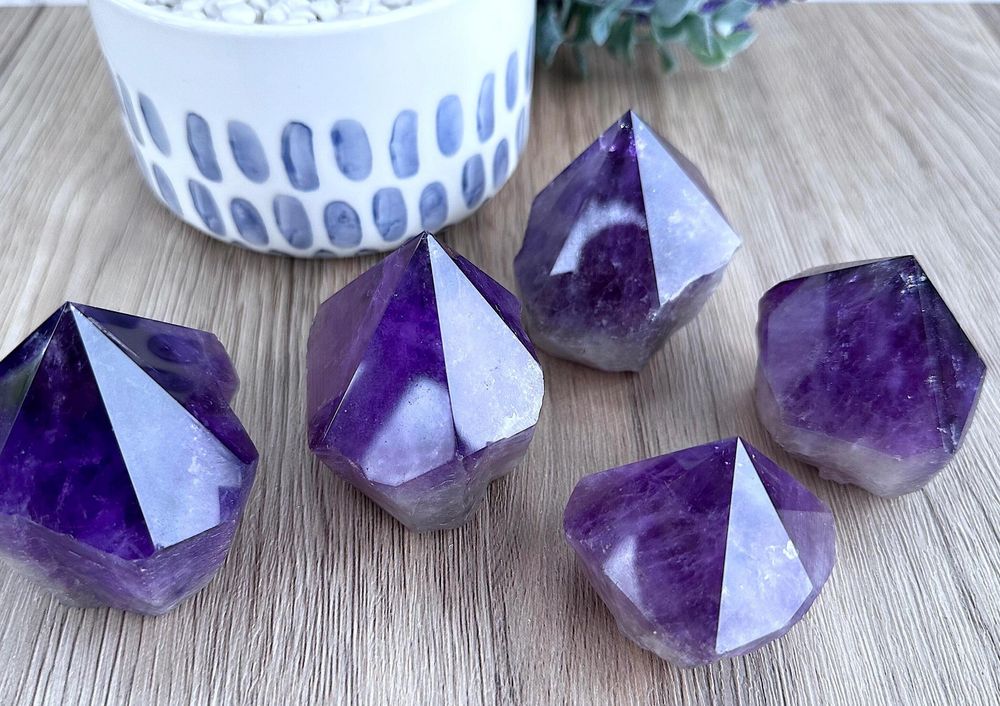 five deep purple amethyst points