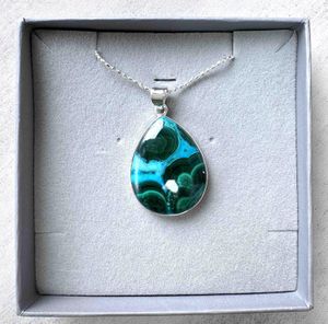 teardrop shape mallacolla sterling silver pendant on a chain in a presentation box
