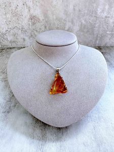triangular genuine Amber sterling silver pendant on a chain