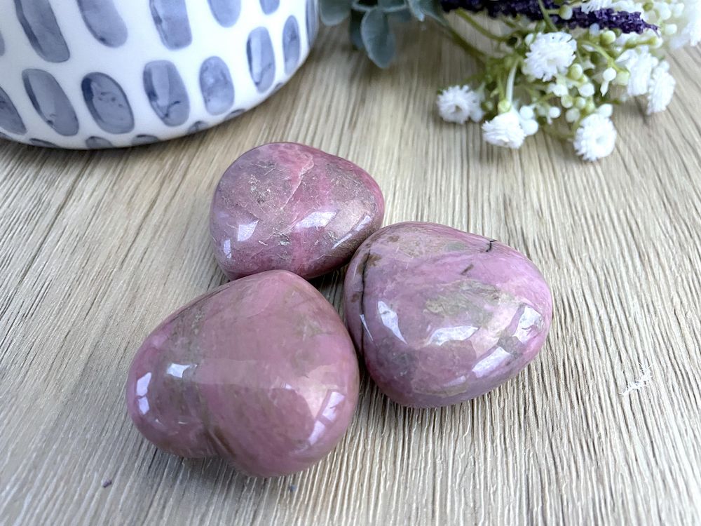 Pink rhodonite crystal puff hearts from the holistic hamper crystals UK