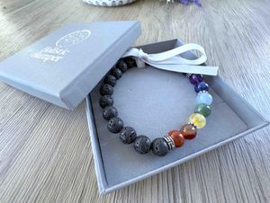 7 Chakra Balancing Crystal Gemstone Bracelet in grey Branded box with diffuser lava beads