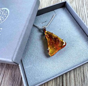 Amber sterling silver pendant in box