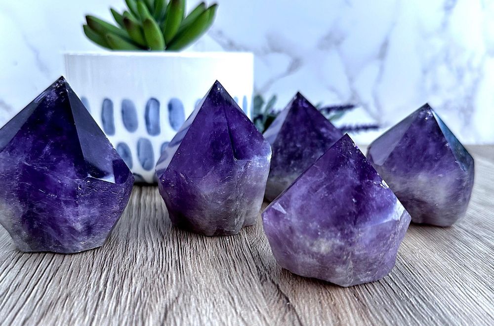 five deep purple amethyst points