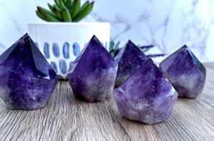 five deep purple amethyst points