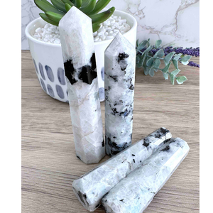 four rainbow moonstone crystal towers black and white with rainbow flash