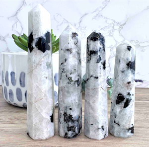 four rainbow moonstone crystal towers black and white with rainbow flash