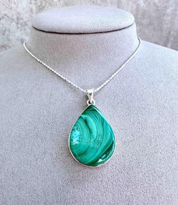 genuine green malachite crystal pendant with sterling silver mount and optional chain
