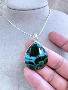 teardrop shape sterling silver crystal teardrop mallacolla pendant on a chain