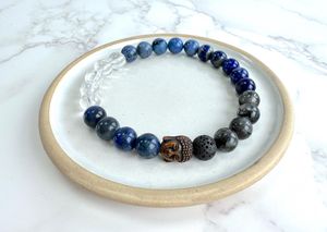 Mens blue mental well-being crystal power bracelet on stretch cord with bronze buddha head