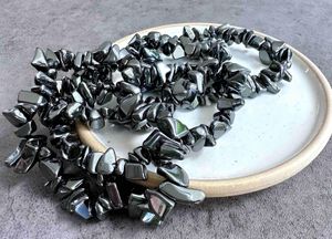 grey metallic hematite chip bracelets one size fits all on a dish