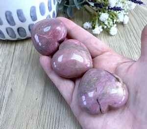Pink rhodonite crystal puff hearts from the holistic hamper crystals UK