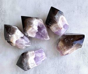 root of transformation crystal point with amethyst Smokey Quartz and white quartz