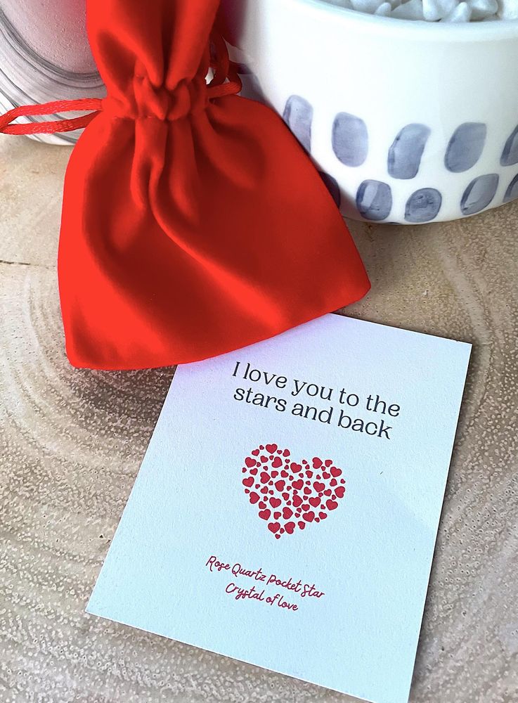 Rose Quartz star with a velvet red bag and a card saying I love you to the stars and back
