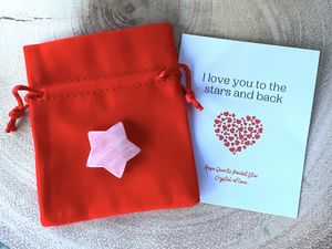 Rose Quartz star with a velvet red bag and a card saying I love you to the stars and back