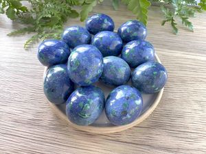 blue green azurite malachite crystal tumble stones on a dish