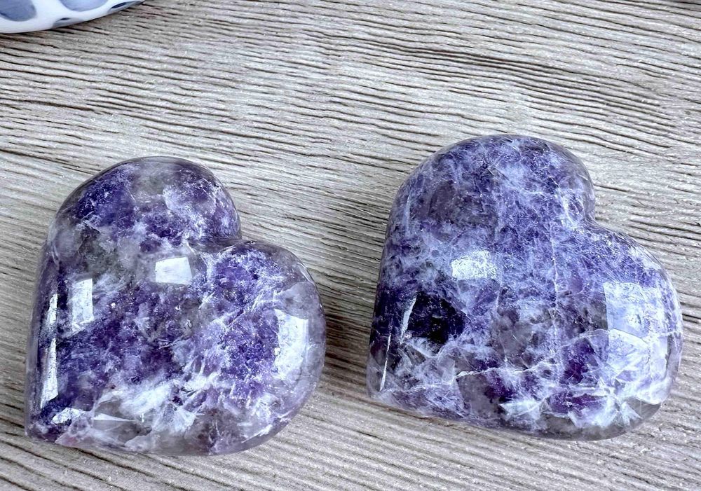 two purple lepidolite puff crystal hearts 5cm in size