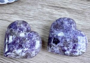 two purple lepidolite puff crystal hearts 5cm in size
