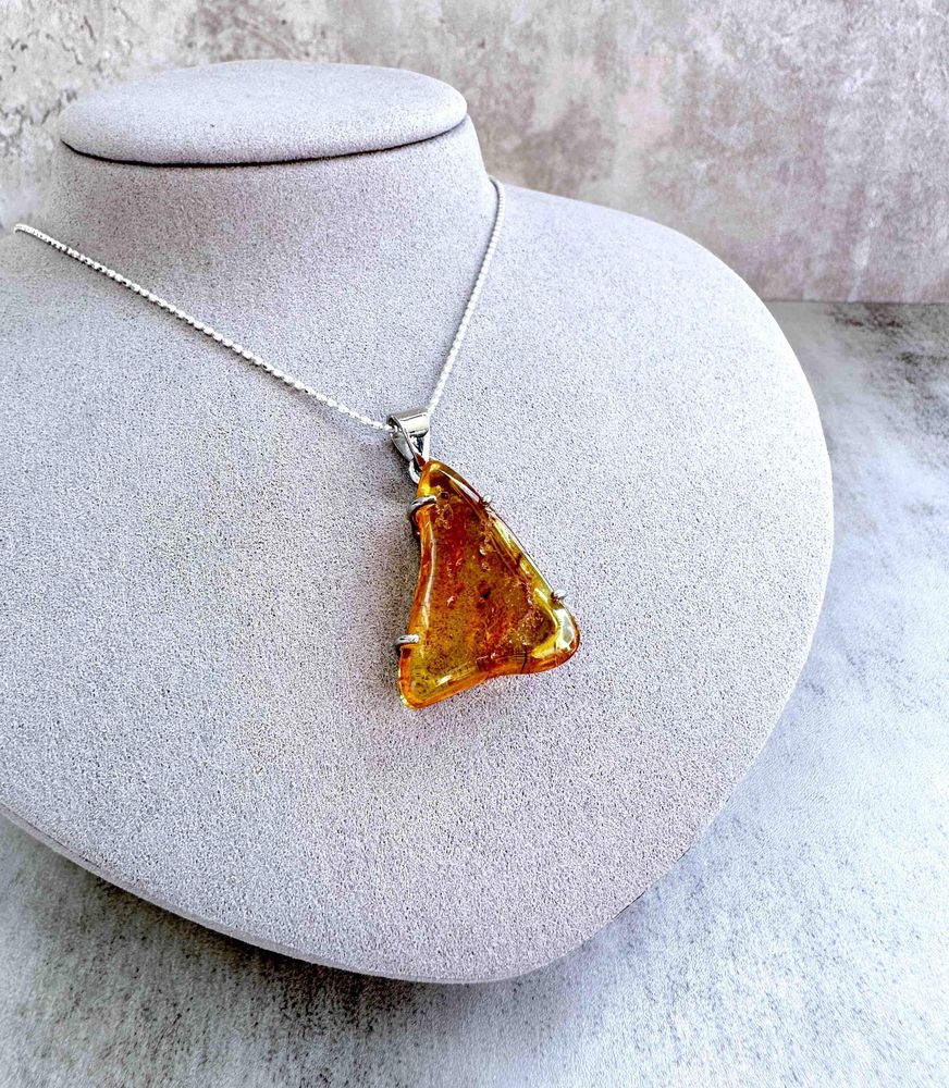 triangular genuine Amber sterling silver pendant on a chain