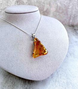 triangular genuine Amber sterling silver pendant on a chain