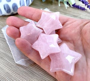 Rose Quartz stars in a hand