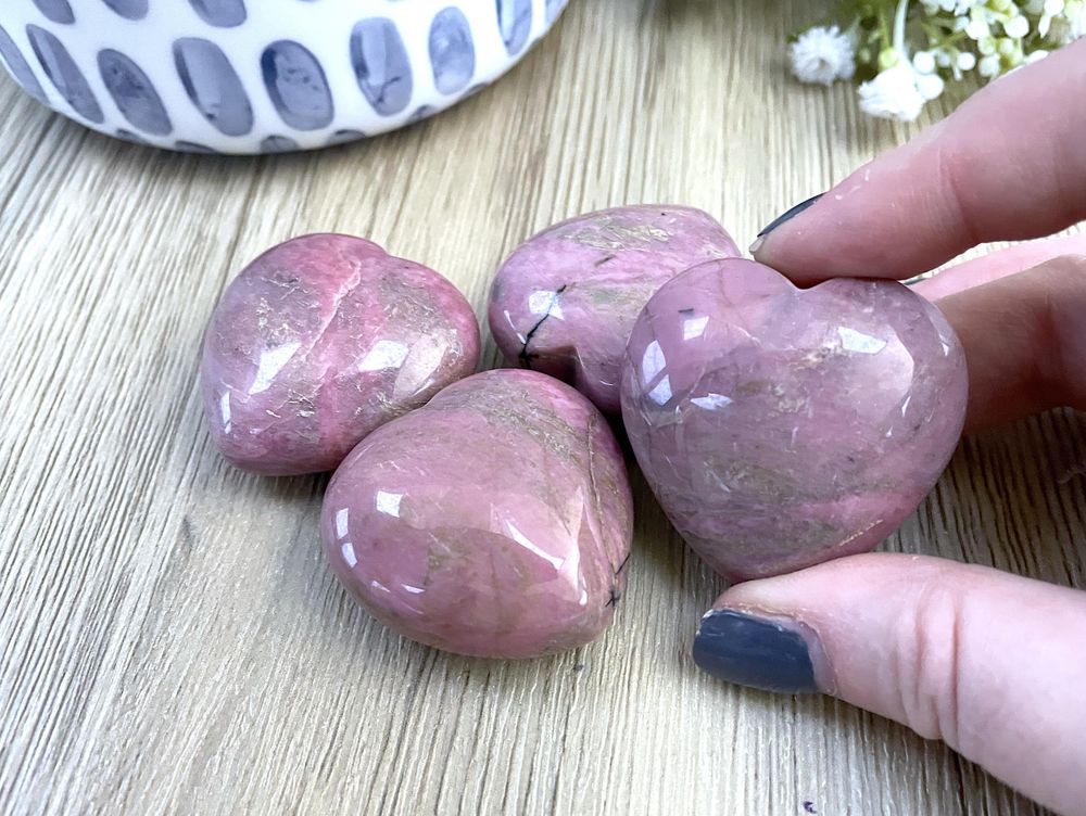 Pink rhodonite crystal puff hearts from the holistic hamper crystals UK