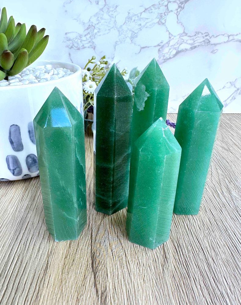green aventurine crystal towers in a group from the holistic hamper