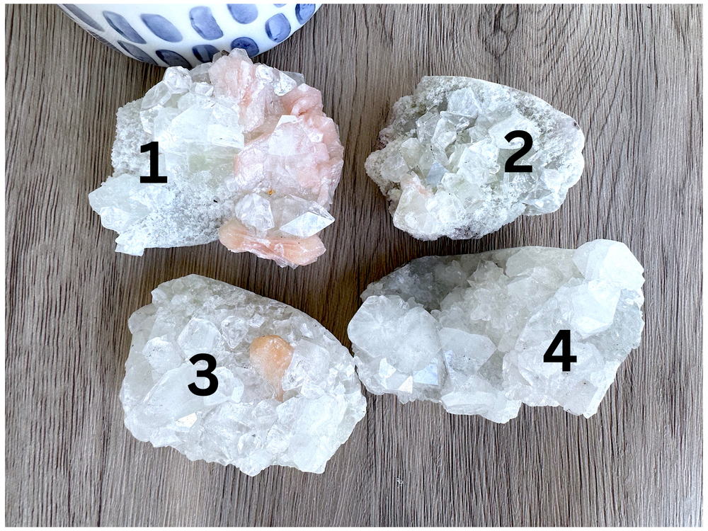 four raw apophyllite crystal clusters numbered