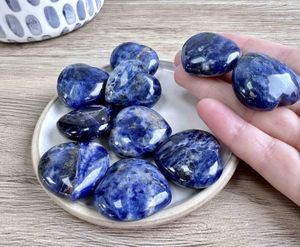 Blue Sodalite crystal hearts 3cm on a dish for intuition and communication