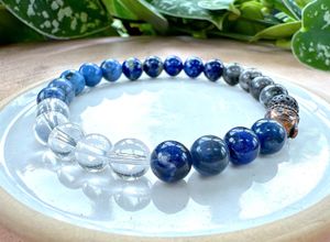 Mens blue mental well-being crystal power bracelet on stretch cord with bronze buddha head
