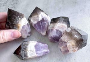 root of transformation crystal point with amethyst Smokey Quartz and white quartz