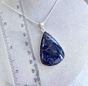 sodality crystal pendant in sterling silver and optional chain with ruler for sizing