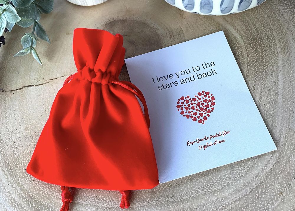 Rose Quartz star with a velvet red bag and a card saying I love you to the stars and back