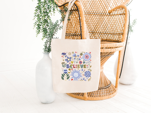 believe tote bag for women and girls hanging on a chair, the holistic hamper