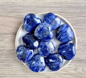 Blue Sodalite crystal hearts 3cm on a dish for intuition and communication