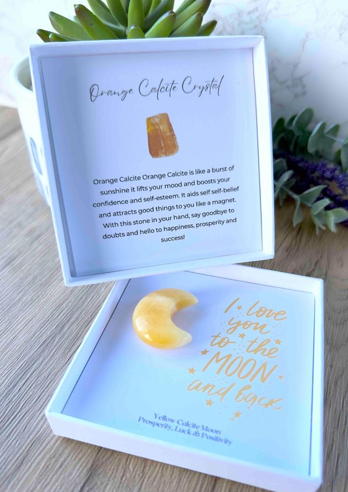 yellow calcite crystal moon in a gift box with the quote I love you to the moon and back within