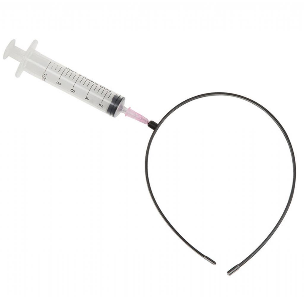Syringe in Head by Bristol Novelties BA1043 and available from Karnival Costumes