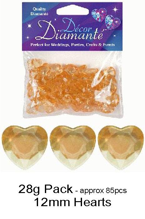 Pack of 28 grams, approximately 85 pieces of 12mm Gold Heart shaped Diamntes for decorating weddings and other spohisticated parties. By Oaktree UK 622999 and available from Karnival Costumes