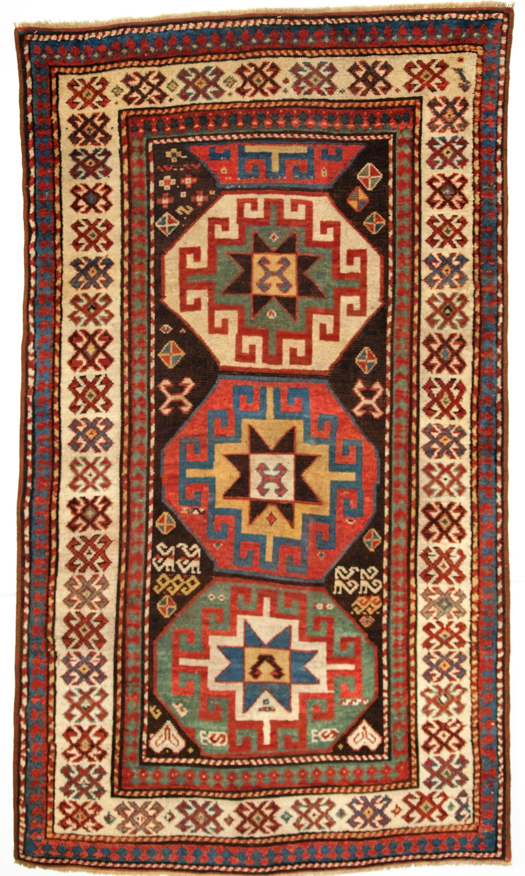 Antique Caucasian Kazak Rug with Memling Gul Medallions