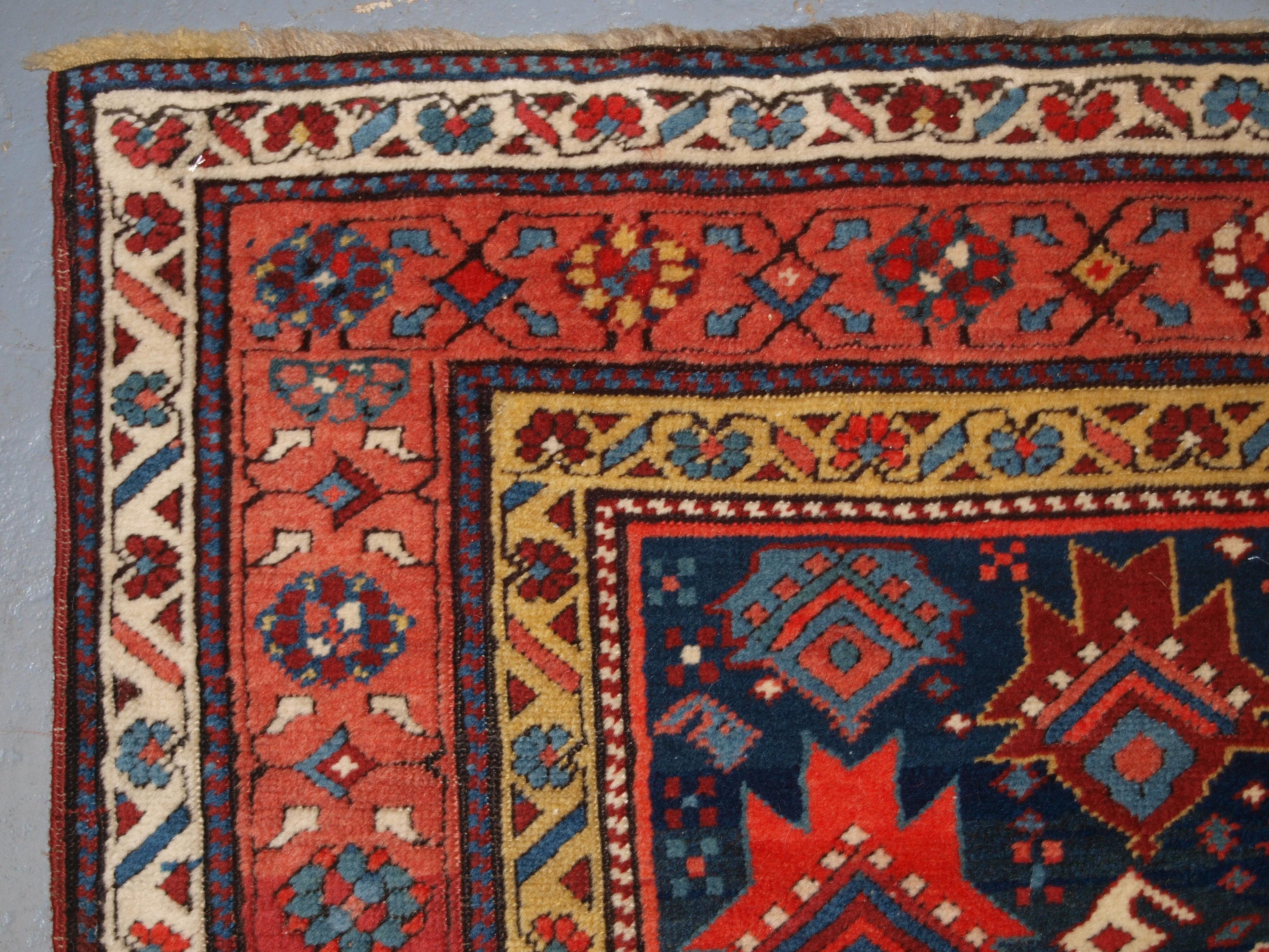 Floral red and yellow corner design of antique south caucasian runner