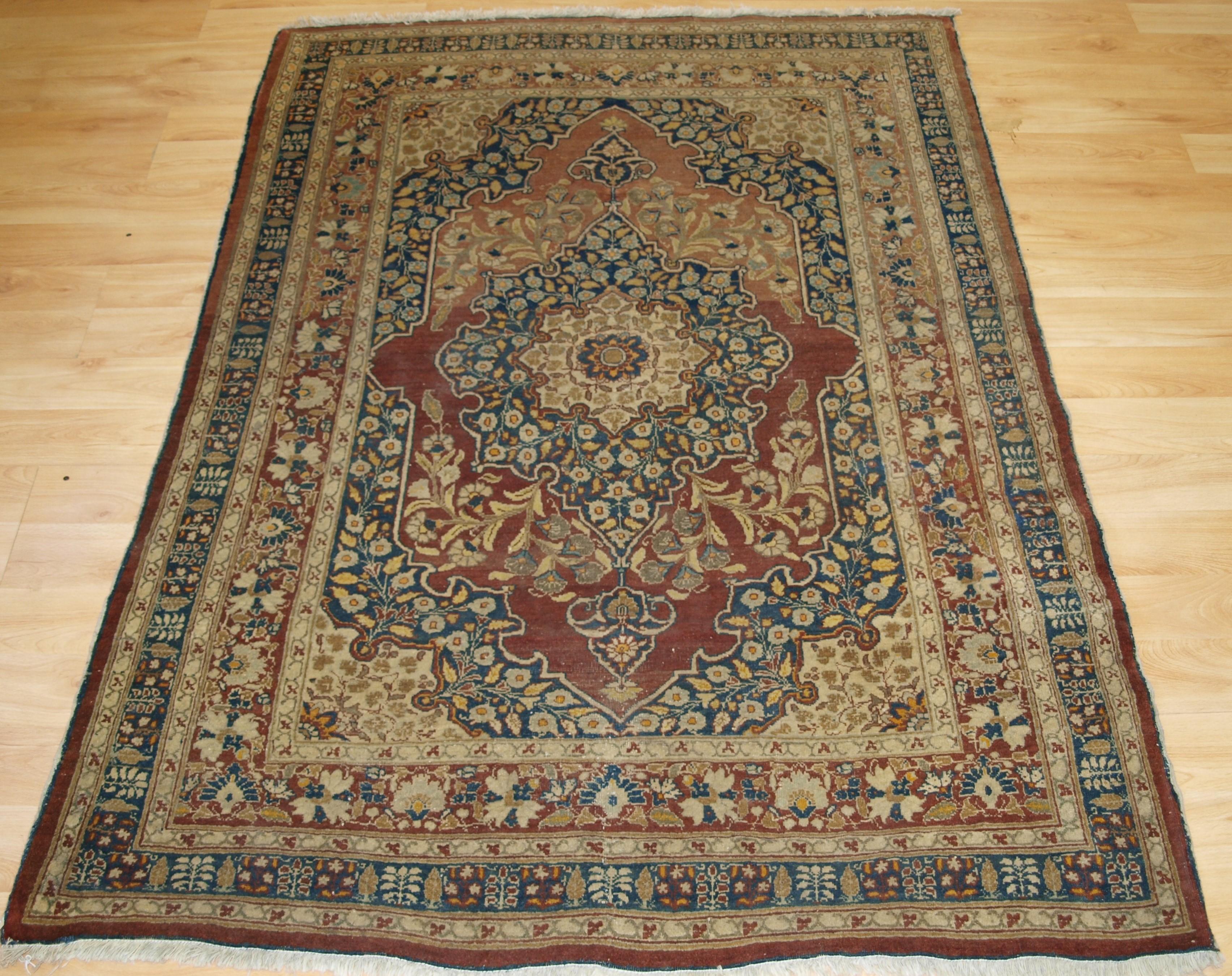 Antique Tabriz Rug Of Classic Design With A Central Medallion Surrounded Fl Sprays
