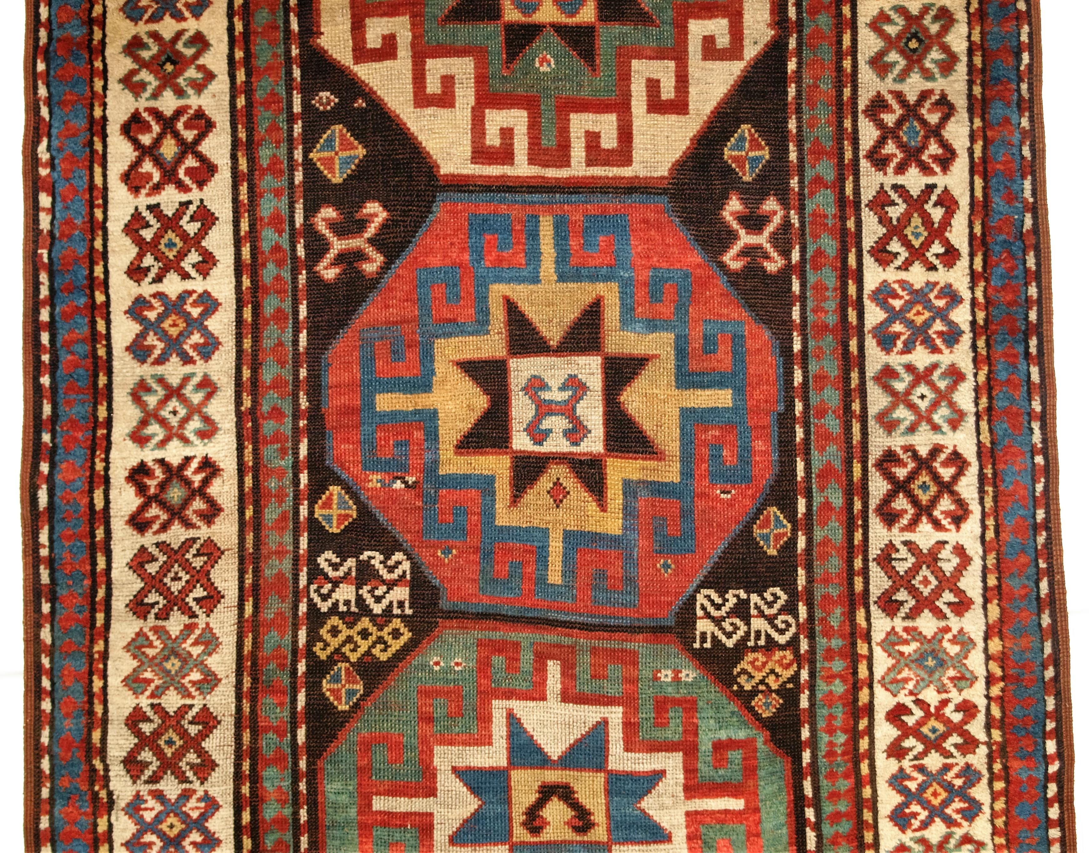 Antique Caucasian Kazak Rug with Memling Gul Medallions