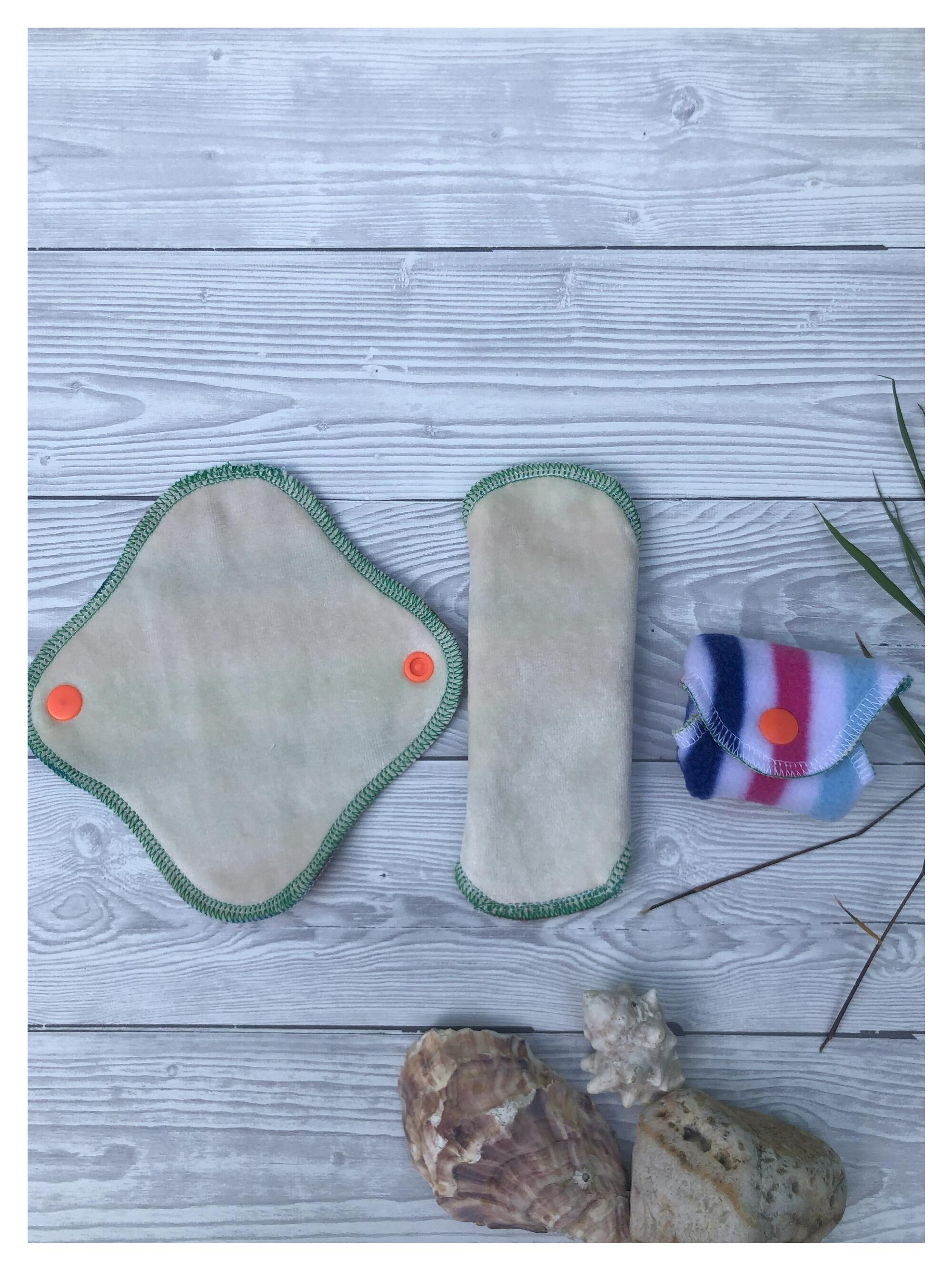 light absorbency period pad shown open, fitted and closed